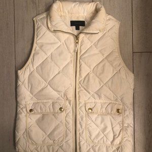 Cream J. Crew Puffer Vest.